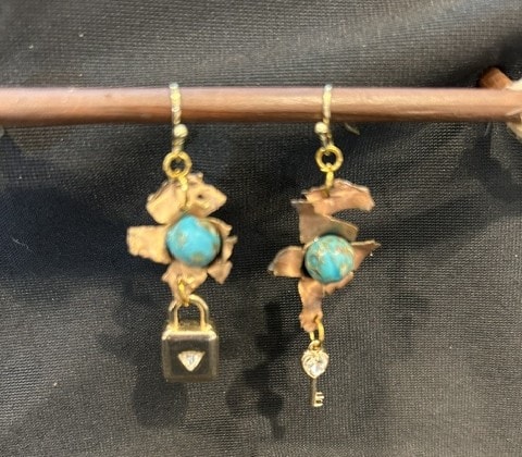 Delicate floral motif brass ring